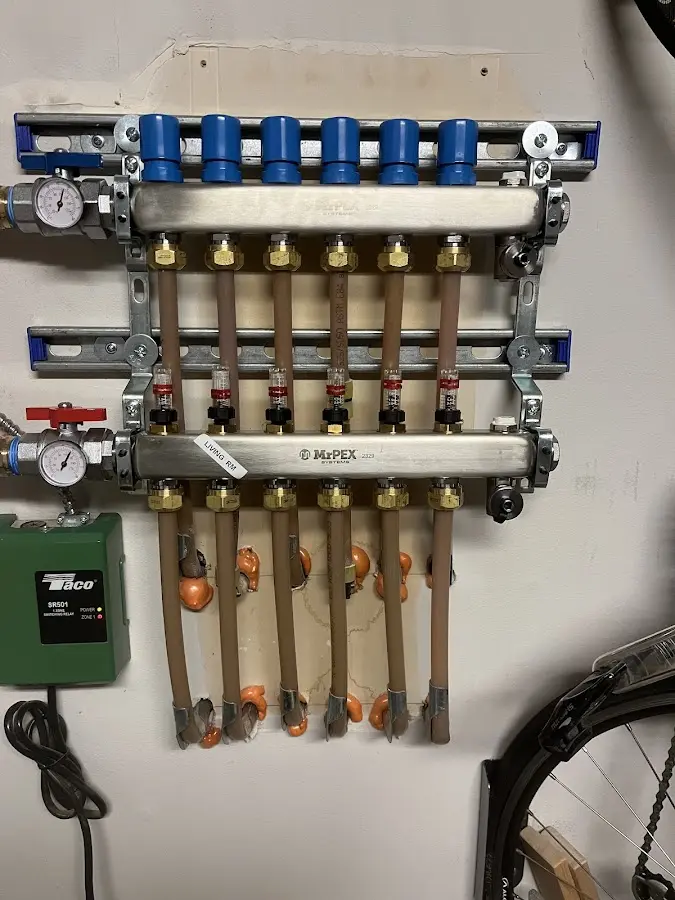 Plumber performing Leak Detection at a residential property in Enfield